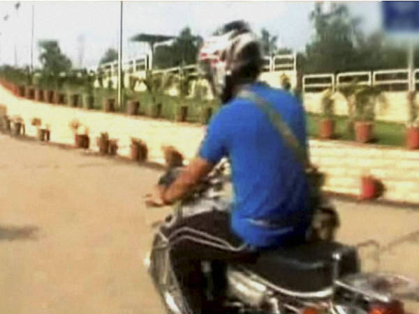 Mahendra Singh Dhoni on bike Mahendra Singh Dhoni on bike