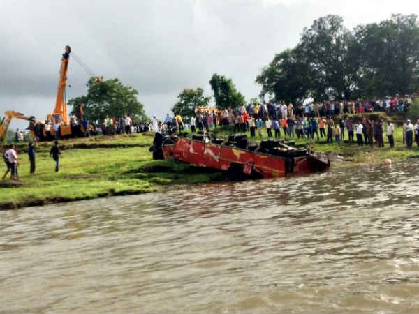Bus wreckage found submerged in water at Mahad. See PICS Bus wreckage found submerged in water at Mahad. See PICS