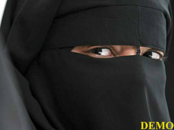 VHP neta in burqa harassing women, caught VHP neta in burqa harassing women, caught