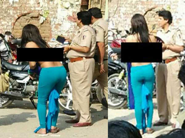 Girl goes topless after standing in ATM queue for hours Girl goes topless after standing in ATM queue for hours