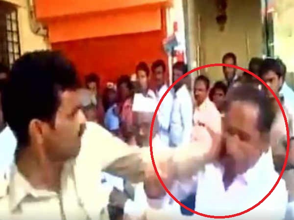 Ex-Army official slapped by a policeman in ATM queue Ex-Army official slapped by a policeman in ATM queue