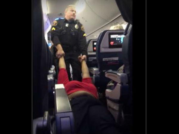 Watch How A Woman Was Dragged Out Of Plane Watch How A Woman Was Dragged Out Of Plane