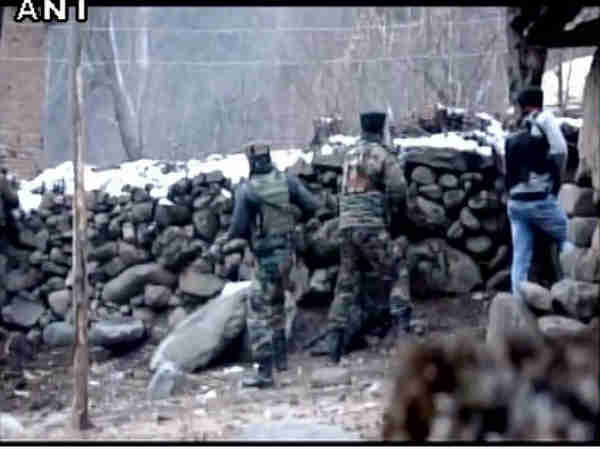 J&K: Encounter underway between security forces & terrorists in Anantnag's Awoora village J&K: Encounter underway between security forces & terrorists in Anantnag's Awoora village