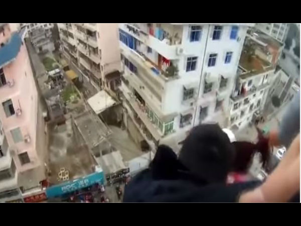 WATCH: Shocking video how man saved her wife by grabbing ponytail as she jumped from 7 story building WATCH: Shocking video how man saved her wife by grabbing ponytail as she jumped from 7 story building