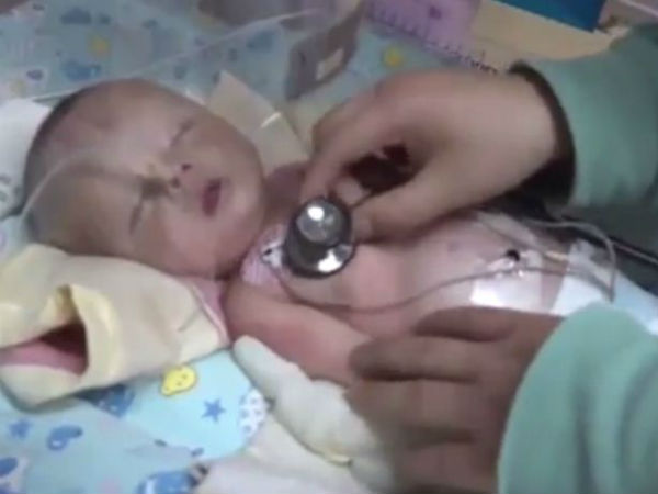 Dog saves newborn baby buried alive in China Dog saves newborn baby buried alive in China