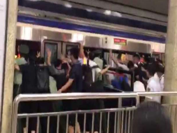 Watch: Passengers Push Train To Rescue Man Stuck In Platform Gap Watch: Passengers Push Train To Rescue Man Stuck In Platform Gap