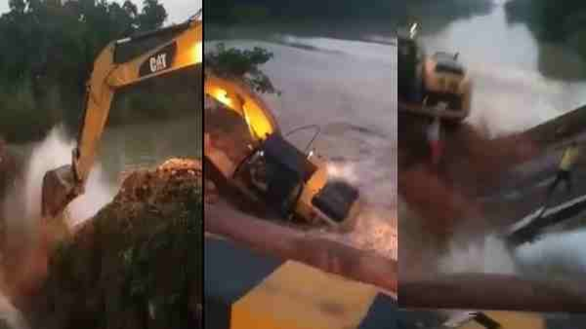 Muzaffarnagar News: Bulldozer fell into the river while demolishing 100 year old bridge Muzaffarnagar News: Bulldozer fell into the river while demolishing 100 year old bridge