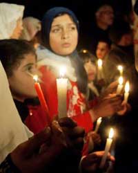 Palestinians at a candlelight march Palestinians at a candlelight march