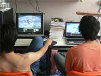 Men with computers Men with computers