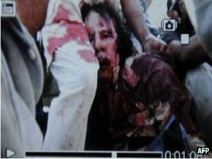 Gaddafi killed by bullet in stomach, UN ordered for the investigation Gaddafi killed by bullet in stomach, UN ordered for the investigation