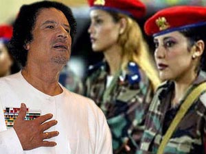 Former Libyan leader Muammar Gaddafi and Female Body Guards Former Libyan leader Muammar Gaddafi and Female Body Guards