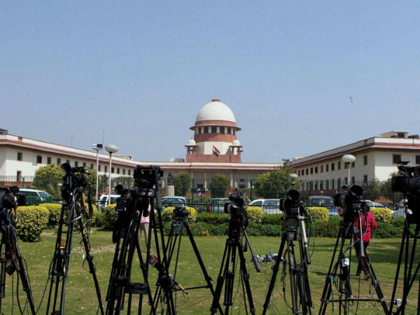 Mudgal committee submits report Mudgal committee submits report