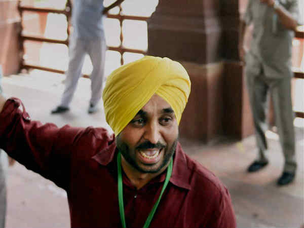 bhagwant man भगवंत मान का अमरिंदर सिंह पर बड़ा आरोप, कांग्रेस का पलटवार bhagwant man भगवंत मान का अमरिंदर सिंह पर बड़ा आरोप, कांग्रेस का पलटवार