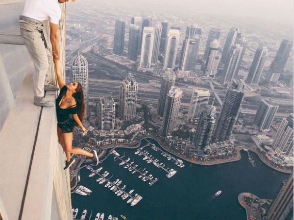 Russian model under fire for daredevil photo shoot VIDEOS Russian model under fire for daredevil photo shoot VIDEOS