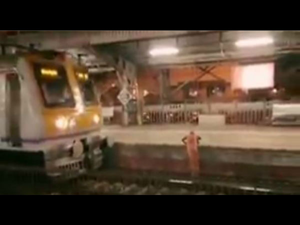 WATCH: Mumbai local train driver did this when he saw an old woman stuck on the railway track WATCH: Mumbai local train driver did this when he saw an old woman stuck on the railway track