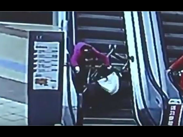 Video:Delivery guys save baby from injuring after stroller capsizes on escalator Video:Delivery guys save baby from injuring after stroller capsizes on escalator