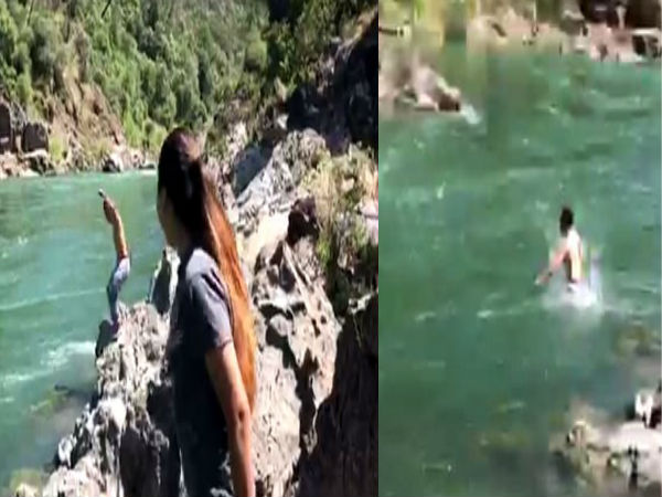 death live video:boyfriend drawn into a raging river and was swept away due to girlfriend challenge death live video:boyfriend drawn into a raging river and was swept away due to girlfriend challenge