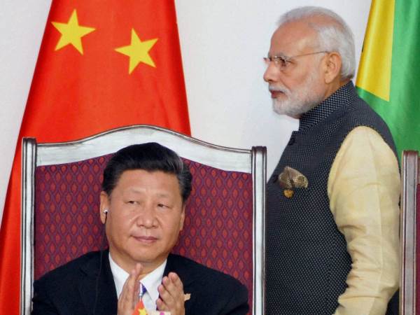 चीन के अधिकारियों की नजरें पीएम मोदी पर टिकी
