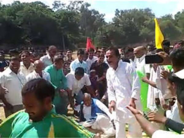 Bihar JDU Minister Shravan Kumar fall during a football kick Bihar JDU Minister Shravan Kumar fall during a football kick