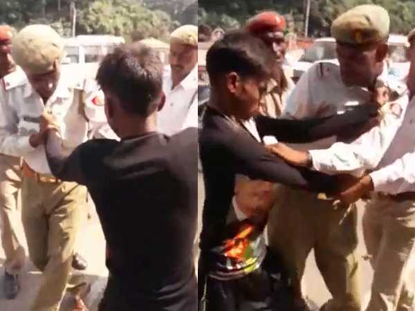 Traffic policeman has been beaten by youths in Saharanpur, Uttar Pradesh. Traffic policeman has been beaten by youths in Saharanpur, Uttar Pradesh.