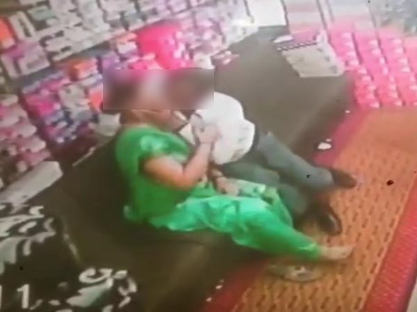 man started kissing his girlfriend in shop and caught on camera man started kissing his girlfriend in shop and caught on camera