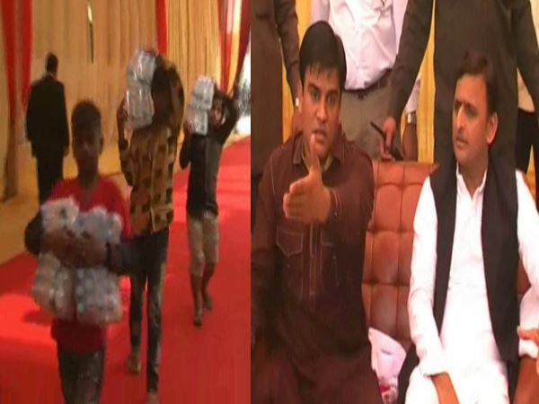 SP workers gets child labour in Akhilesh Yadav's presence SP workers gets child labour in Akhilesh Yadav's presence