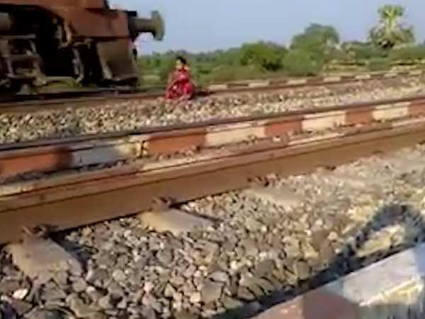 Public made video of a girl who was on rail track to suicide Public made video of a girl who was on rail track to suicide