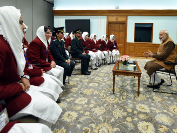 A picture of Prime Minister Narendra Modi with school children is going viral on social media A picture of Prime Minister Narendra Modi with school children is going viral on social media