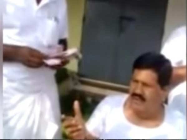 AIADMK MLA distributes money liquor to cadres Caught on camera AIADMK MLA distributes money liquor to cadres Caught on camera