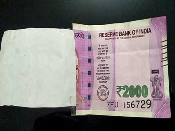 torn 2000 note withdraw in faridabad atm torn 2000 note withdraw in faridabad atm