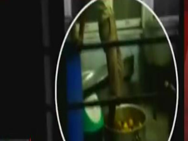 Caught on cam: Railway pantry employee mashing potatoes with his feet Caught on cam: Railway pantry employee mashing potatoes with his feet