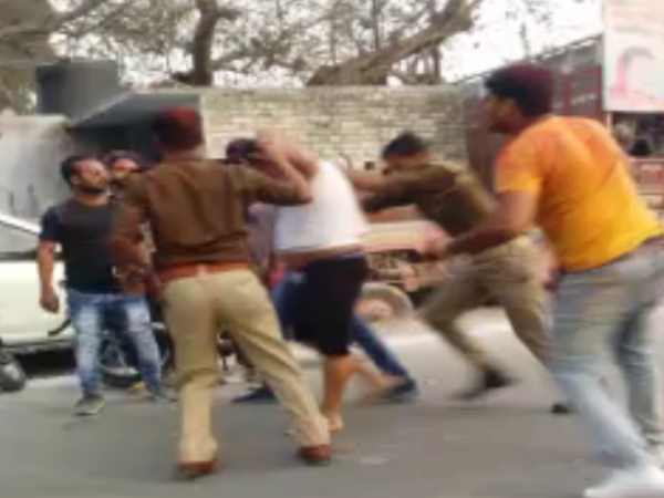 Police beat shoe businessman in Kanpur, video viral Police beat shoe businessman in Kanpur, video viral