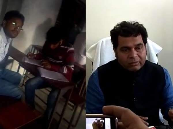 Students writing answer opening book in exam in Mathura Students writing answer opening book in exam in Mathura