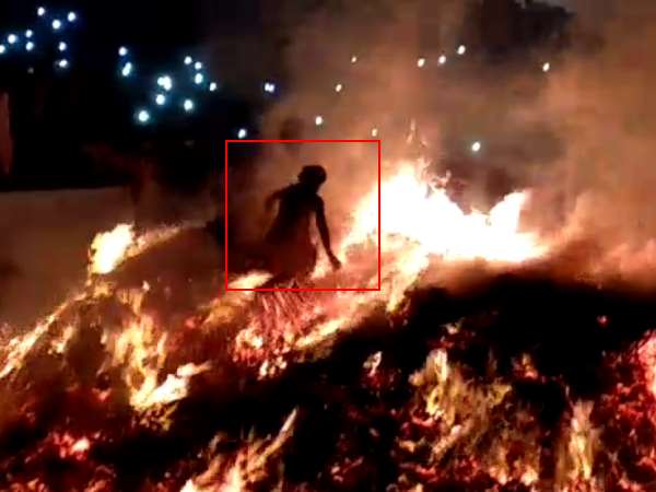 Panda of Mathura run through fire of Holika in Mathura Panda of Mathura run through fire of Holika in Mathura