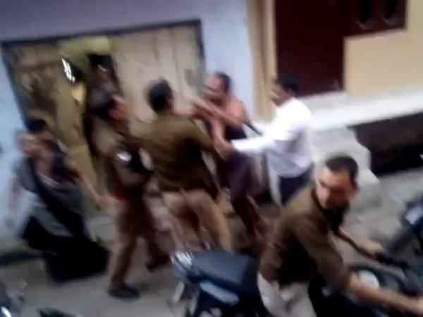Mother son beaten by UP Police in Mathura Mother son beaten by UP Police in Mathura