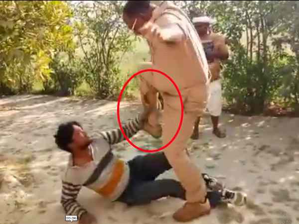 viral Video of the beating of a man by a policeman in Pratapgarh viral Video of the beating of a man by a policeman in Pratapgarh