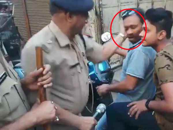 Meerut SP city slaps young man Meerut SP city slaps young man
