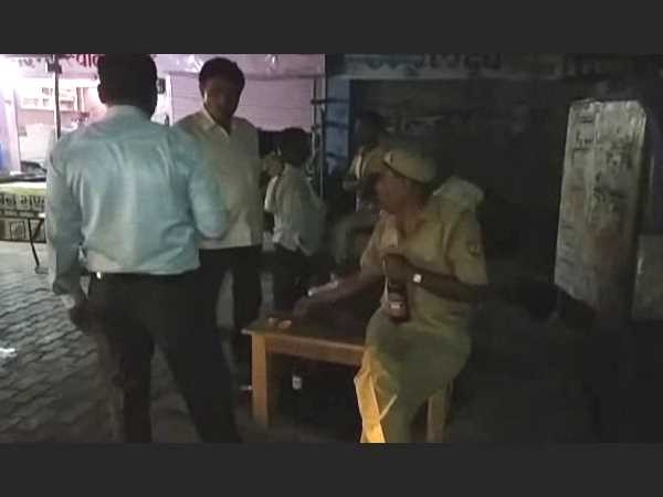 Policemen drinking wine in public place in Kannauj Policemen drinking wine in public place in Kannauj