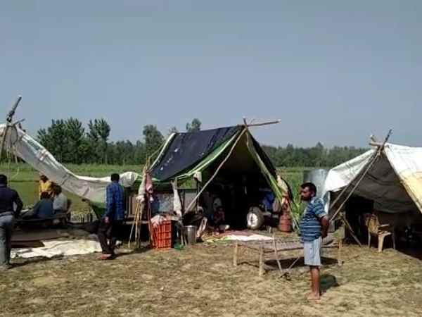 Families living in field after tension on loudspeaker in Bijnor Families living in field after tension on loudspeaker in Bijnor