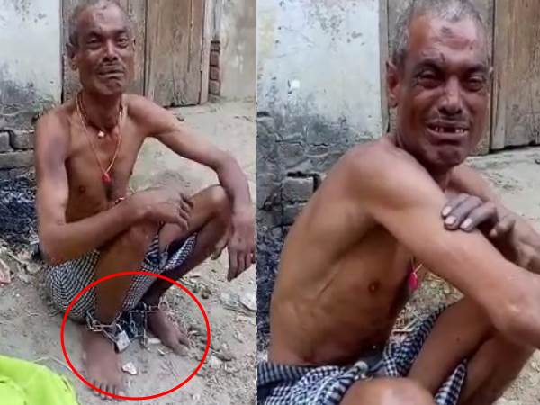jaunpur police tied a man with iron chain in open jaunpur police tied a man with iron chain in open