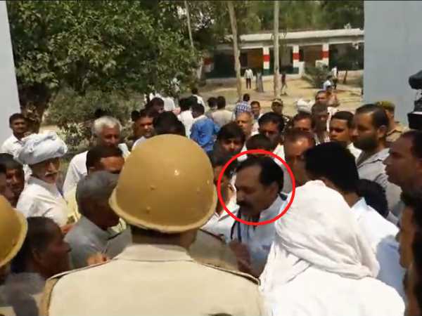 kairana bypoll election 2018 BJP leader opened the gate of polling booth kairana bypoll election 2018 BJP leader opened the gate of polling booth
