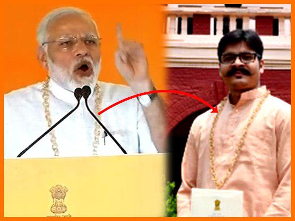 PM Narendra Modi obliges IIT student, gifts him a gold garland PM Narendra Modi obliges IIT student, gifts him a gold garland