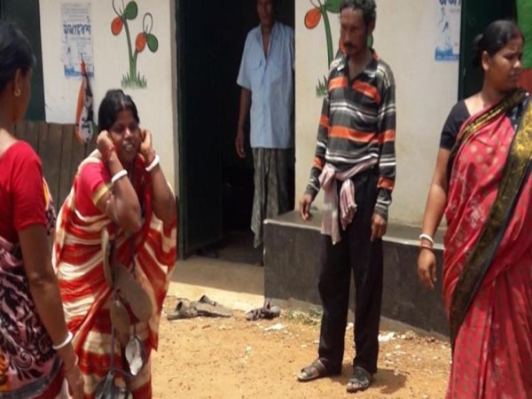 shameful Trinamool congress worker forced woman to walk with garland of shoes shameful Trinamool congress worker forced woman to walk with garland of shoes