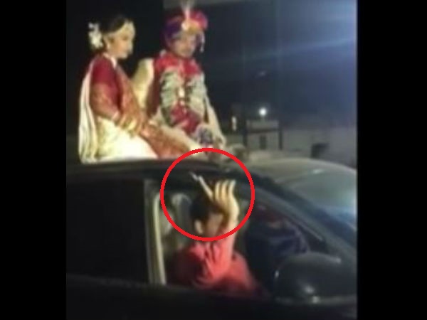 Bride and Groom in open Audi and Driver Firing Openly in Wedding in Rajkot, Gujarat. Bride and Groom in open Audi and Driver Firing Openly in Wedding in Rajkot, Gujarat.