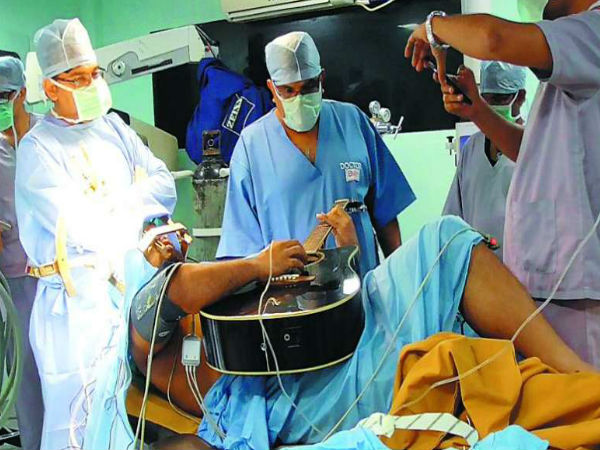 Dhaka musician strums guitar during brain surgery in Bengaluru Dhaka musician strums guitar during brain surgery in Bengaluru