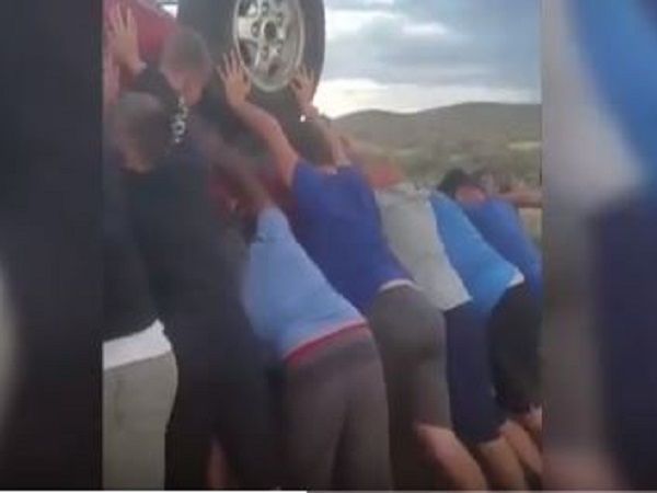 teenage football players rescued two from overturned car teenage football players rescued two from overturned car