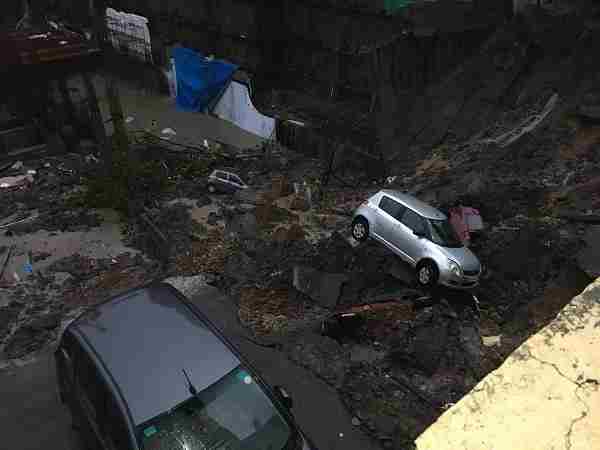 Mumbai Rains: 7 cars damaged after wall of an under construction building collapsed in Wadala Mumbai Rains: 7 cars damaged after wall of an under construction building collapsed in Wadala