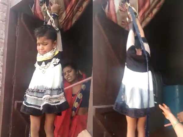 mother beat four year old daughter by hanging on the door in mathura mother beat four year old daughter by hanging on the door in mathura