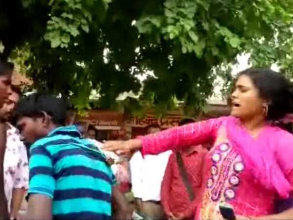 women beat boy teasing viral video beating on road in Mau women beat boy teasing viral video beating on road in Mau