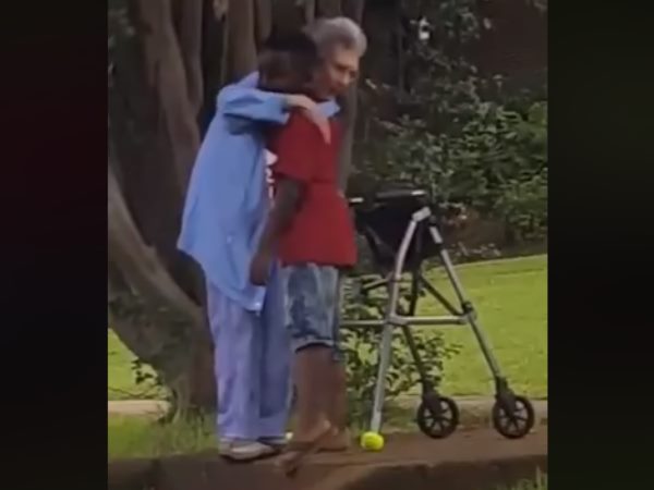 8 year boy help old woman winning hearts Video goes viral 8 year boy help old woman winning hearts Video goes viral